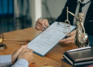 lawyer discussing legal matters to his client