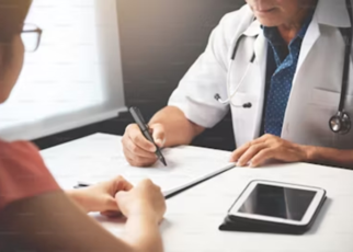 https://unsplash.com/photos/asian-senior-male-doctor-discussing-with-female-patient-in-medical-room-_kOqaiZD4ik